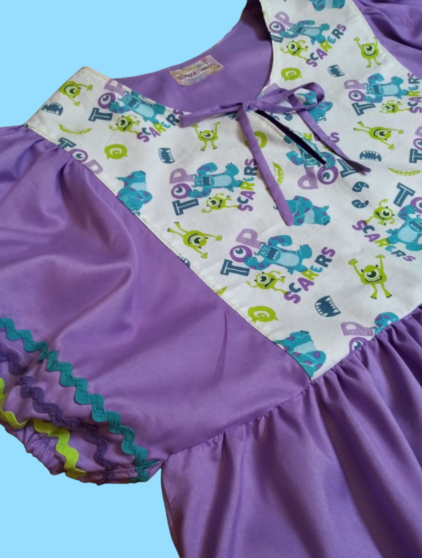 Purple Monsters Inc. dress (size L-XL)