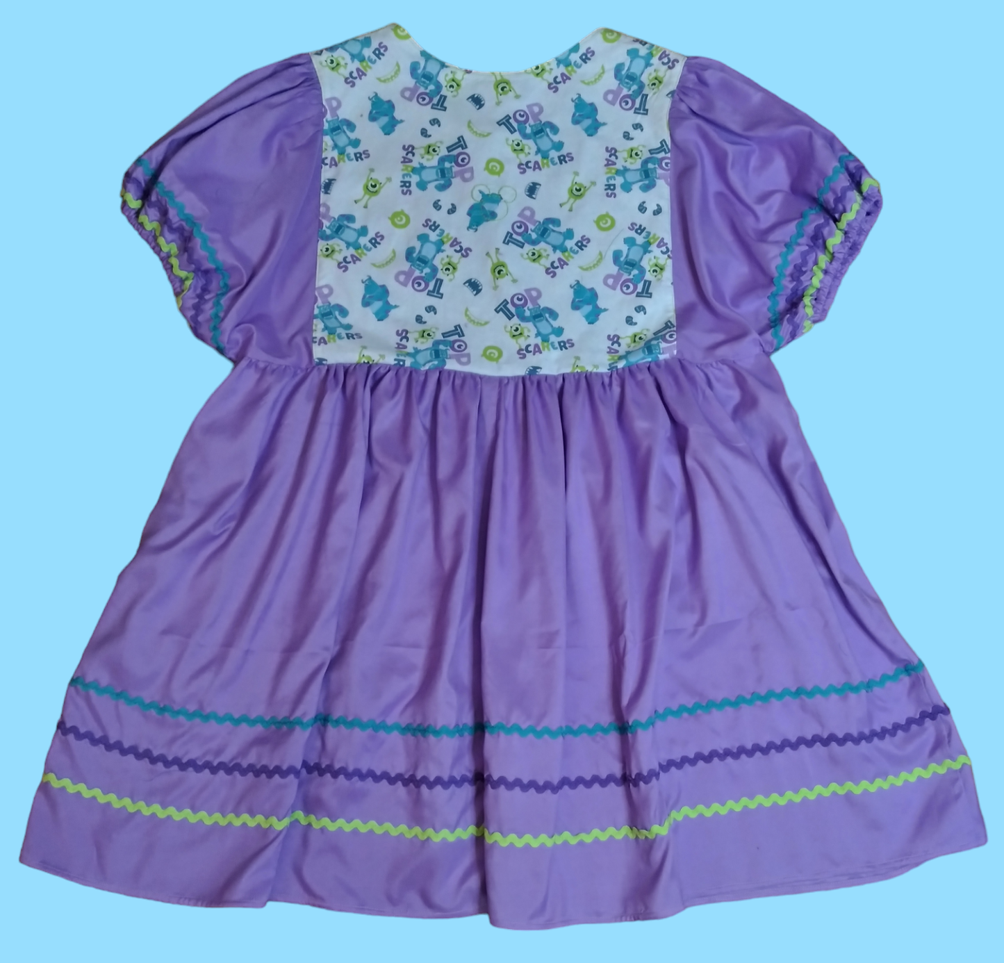 Purple Monsters Inc. dress (size L-XL)